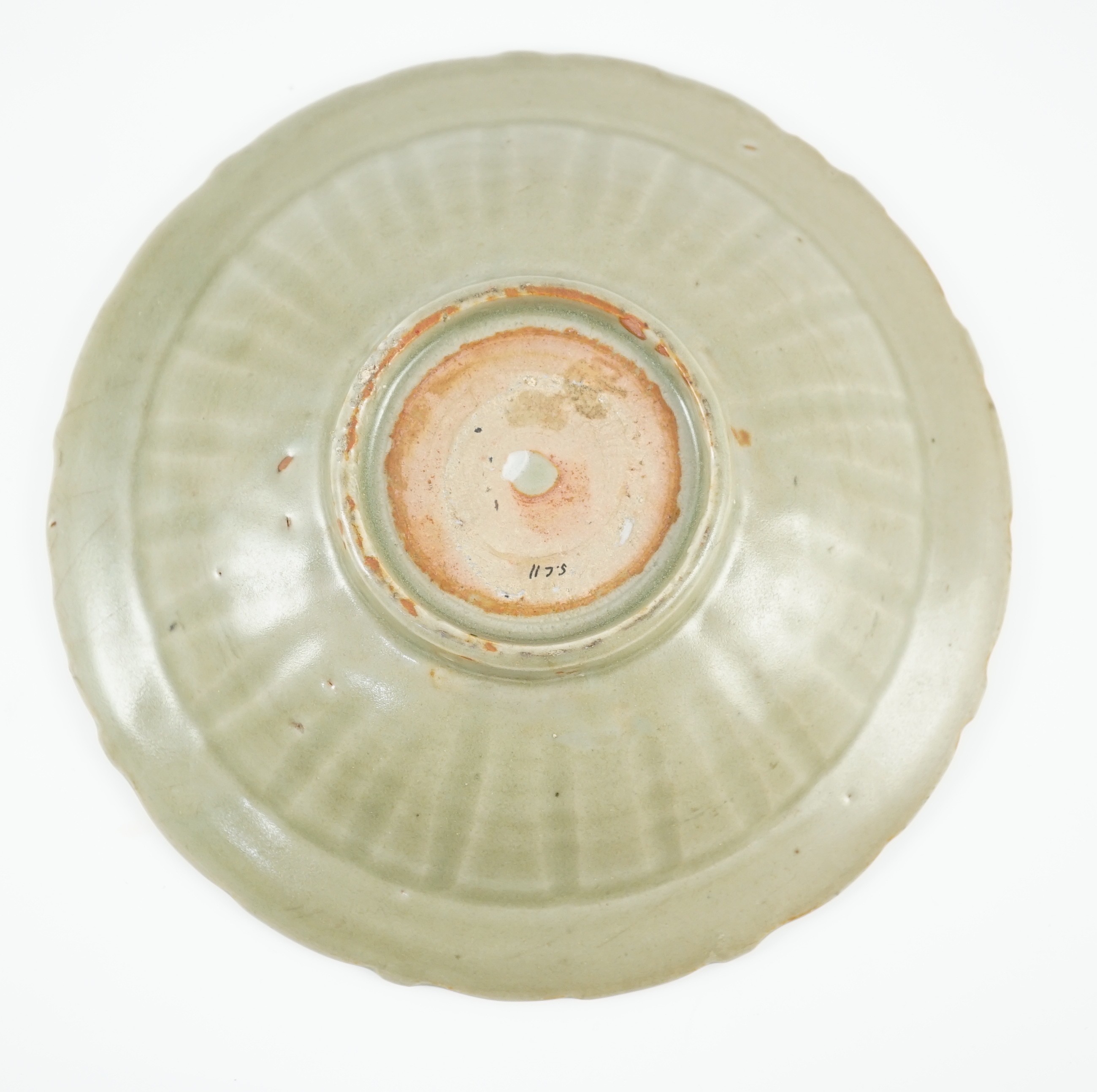 A Chinese Longquan celadon barbed rim dish, Yuan-early Ming dynasty, 14th/15th century, 22.5cm diameter